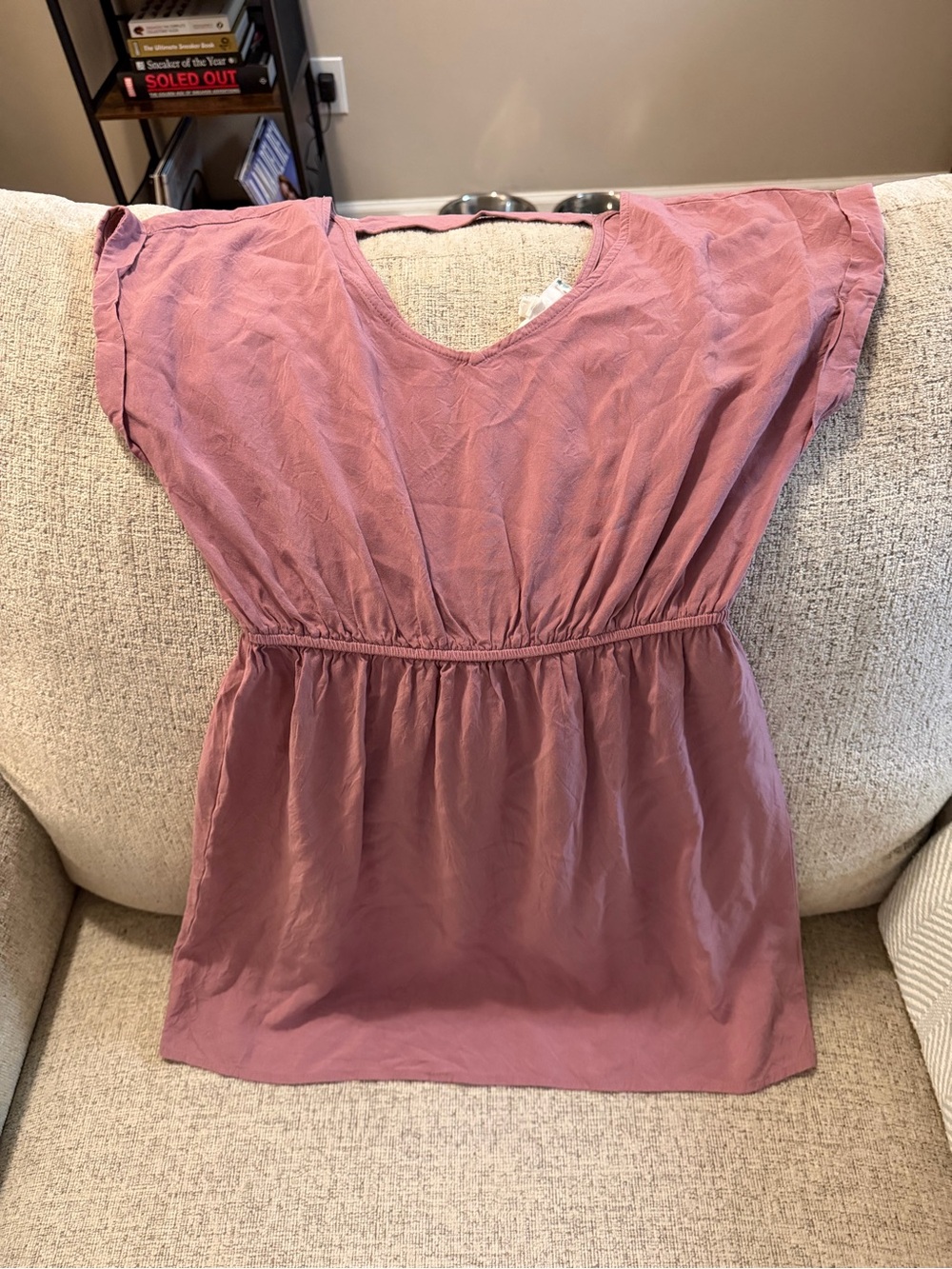 Pink Rose dress with open back detail
Size S